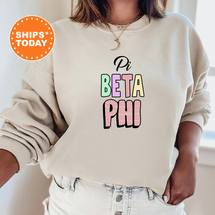 a woman wearing a sweatshirt with the word beta phi printed on it