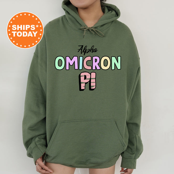 a woman wearing a green hoodie with the words aloha omicron