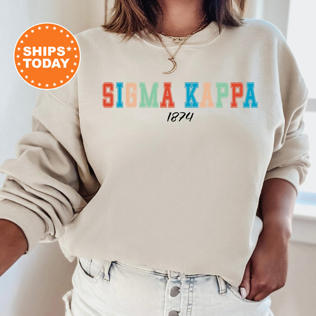 a woman wearing a sweatshirt with the words sima kapa printed on it