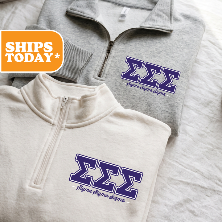 Two gray and white sweatshirts with the Sigma Greek letters " Sigma" printed on them, along with the Sigma Greek logo.