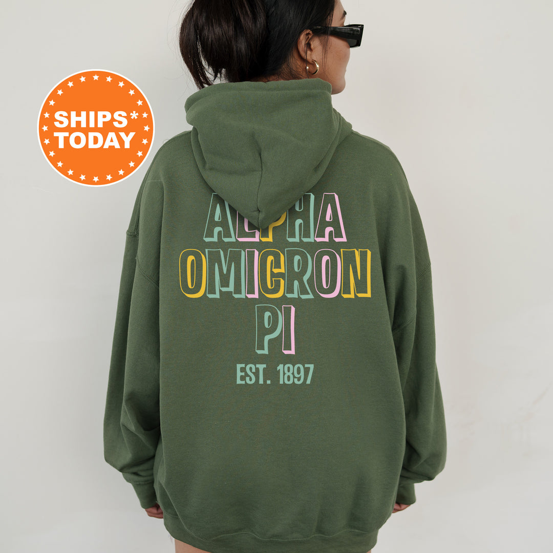 a woman wearing a green hoodie with the words alha omgron on