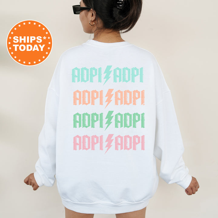 a woman wearing a sweatshirt with the words appliqued on it