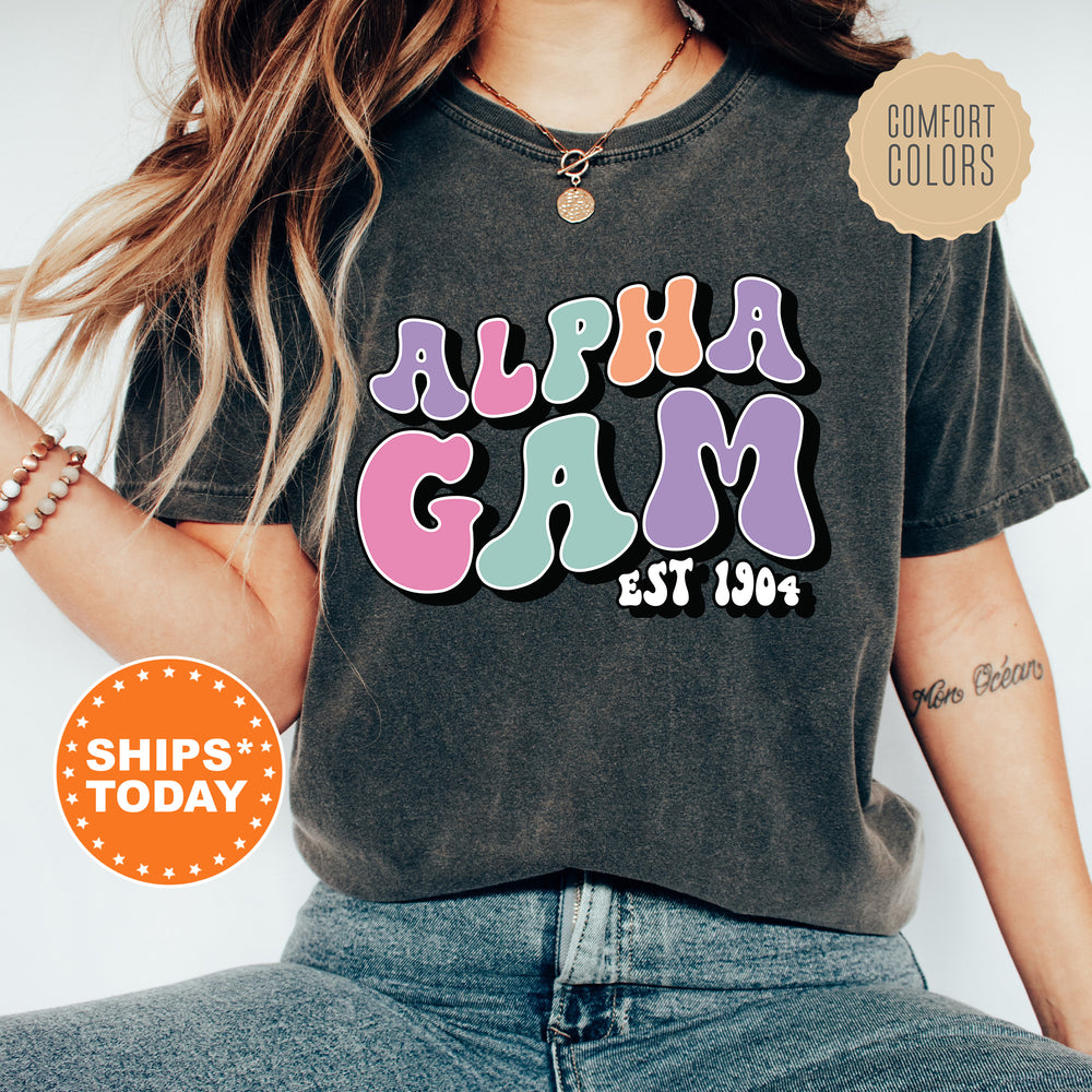 a woman wearing a black shirt with the words aloha gam on it