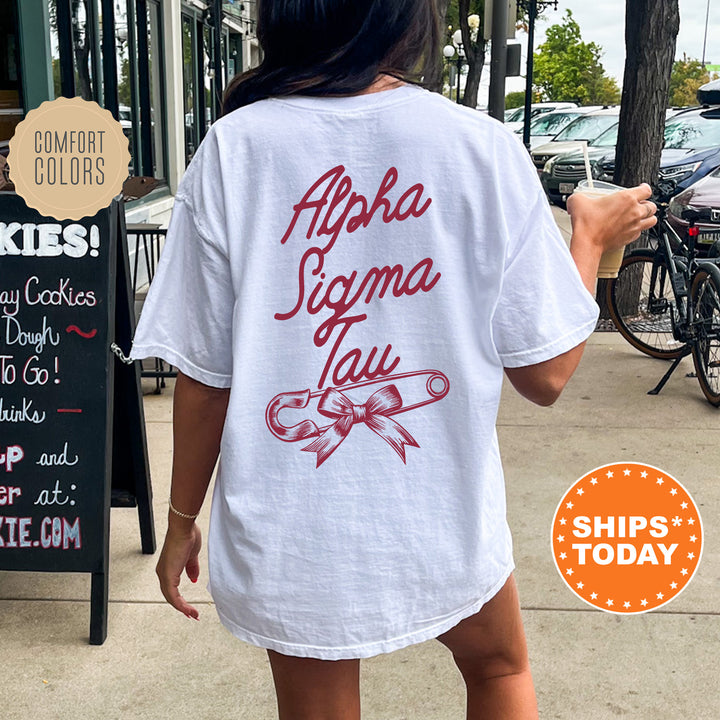a woman walking down a sidewalk while wearing a white shirt