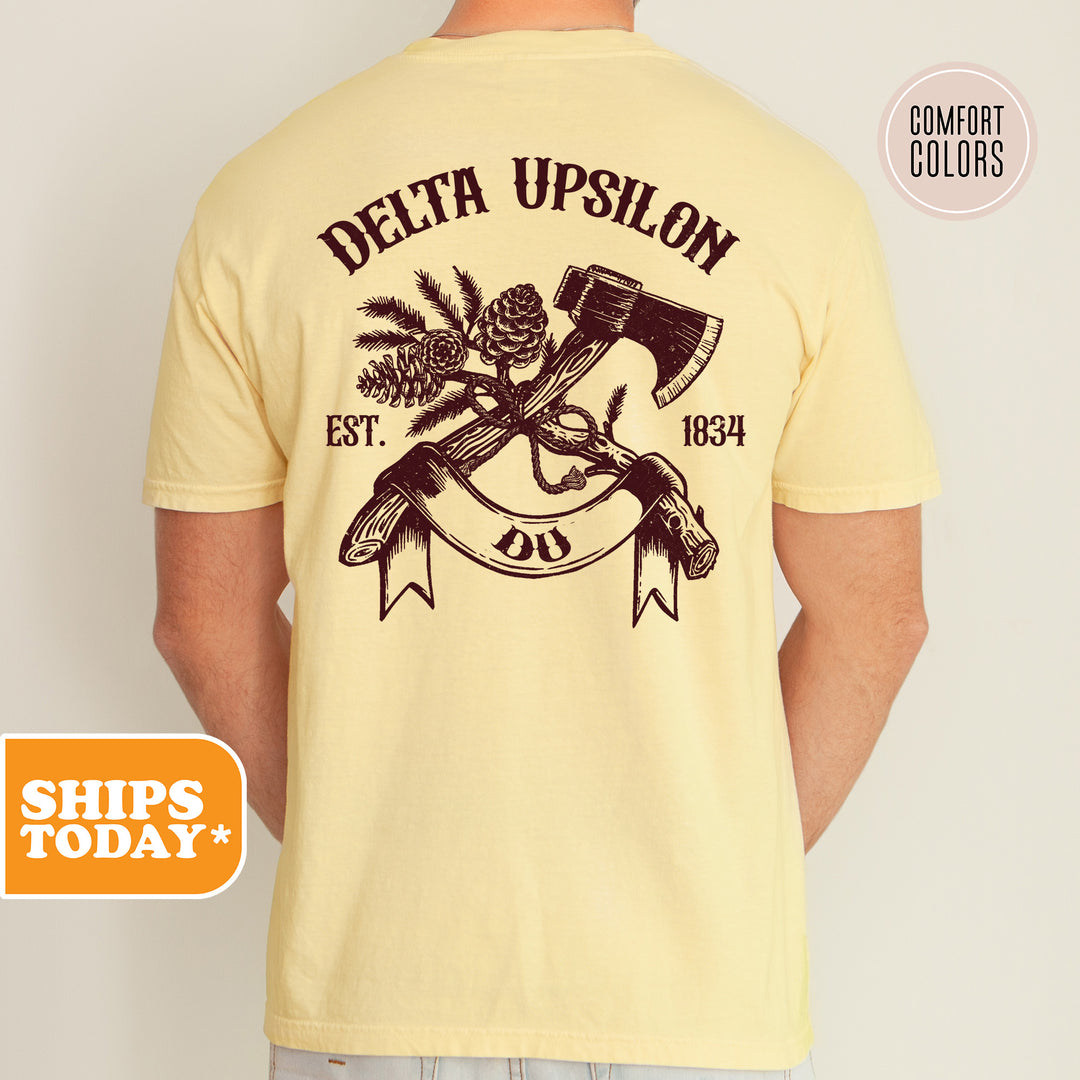 a man wearing a t - shirt that says delta upsilon