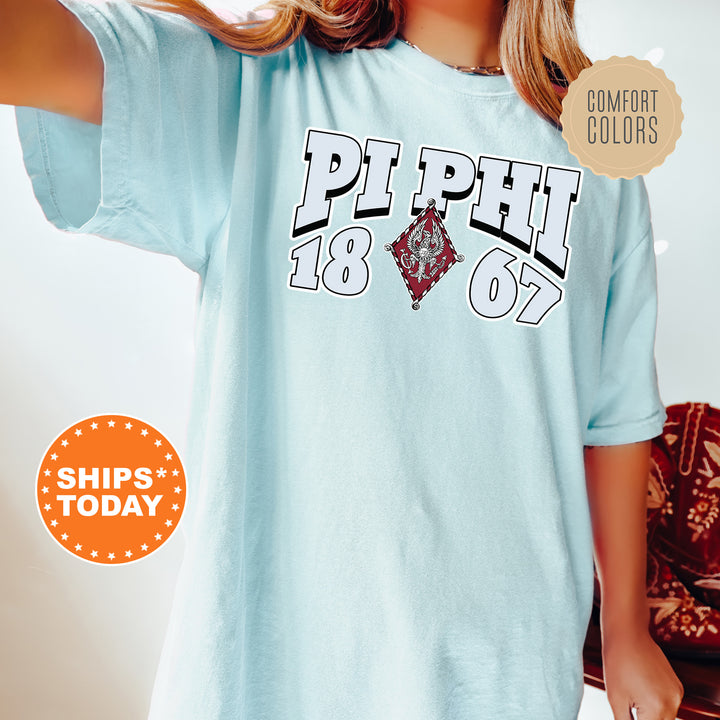 a woman wearing a blue shirt with the words phi phi phi on it