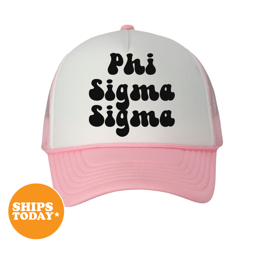 A pink and white baseball cap with the text "Phi Sigma Delta" printed on it.