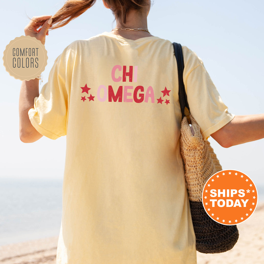 a woman walking on a beach holding a bag