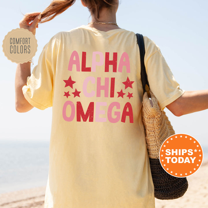 a woman is walking on the beach with her hair in a ponytail