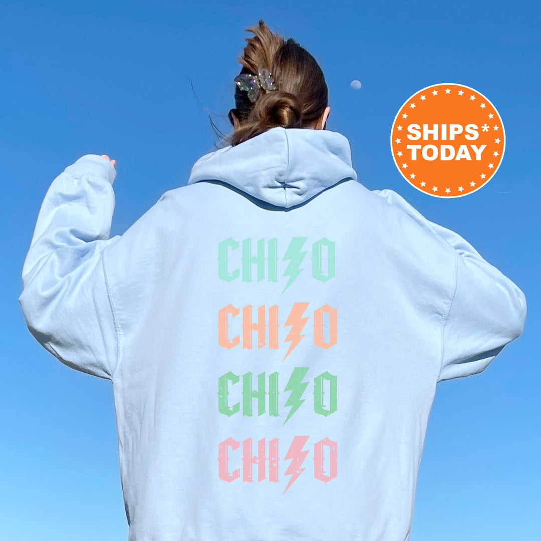 a woman wearing a white hoodie with the words chicago on it