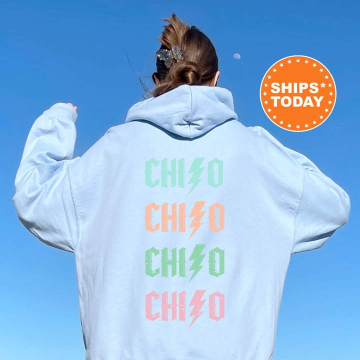 a woman wearing a white hoodie with the words chicago on it