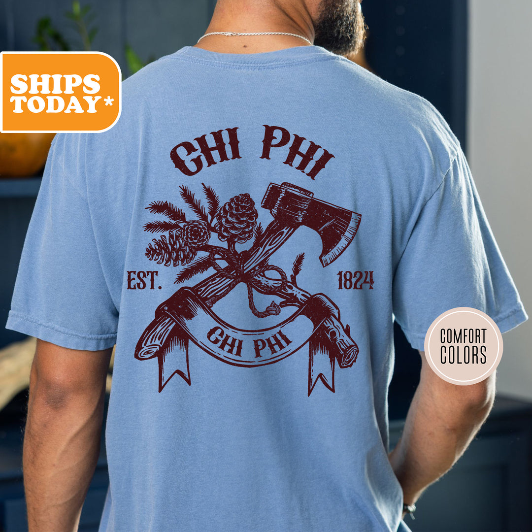 a man wearing a blue shirt with an image of a hammer and a pine tree