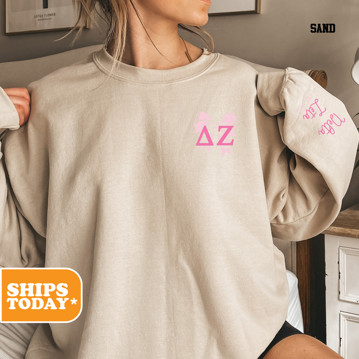 a woman wearing a sweatshirt with pink letters on it