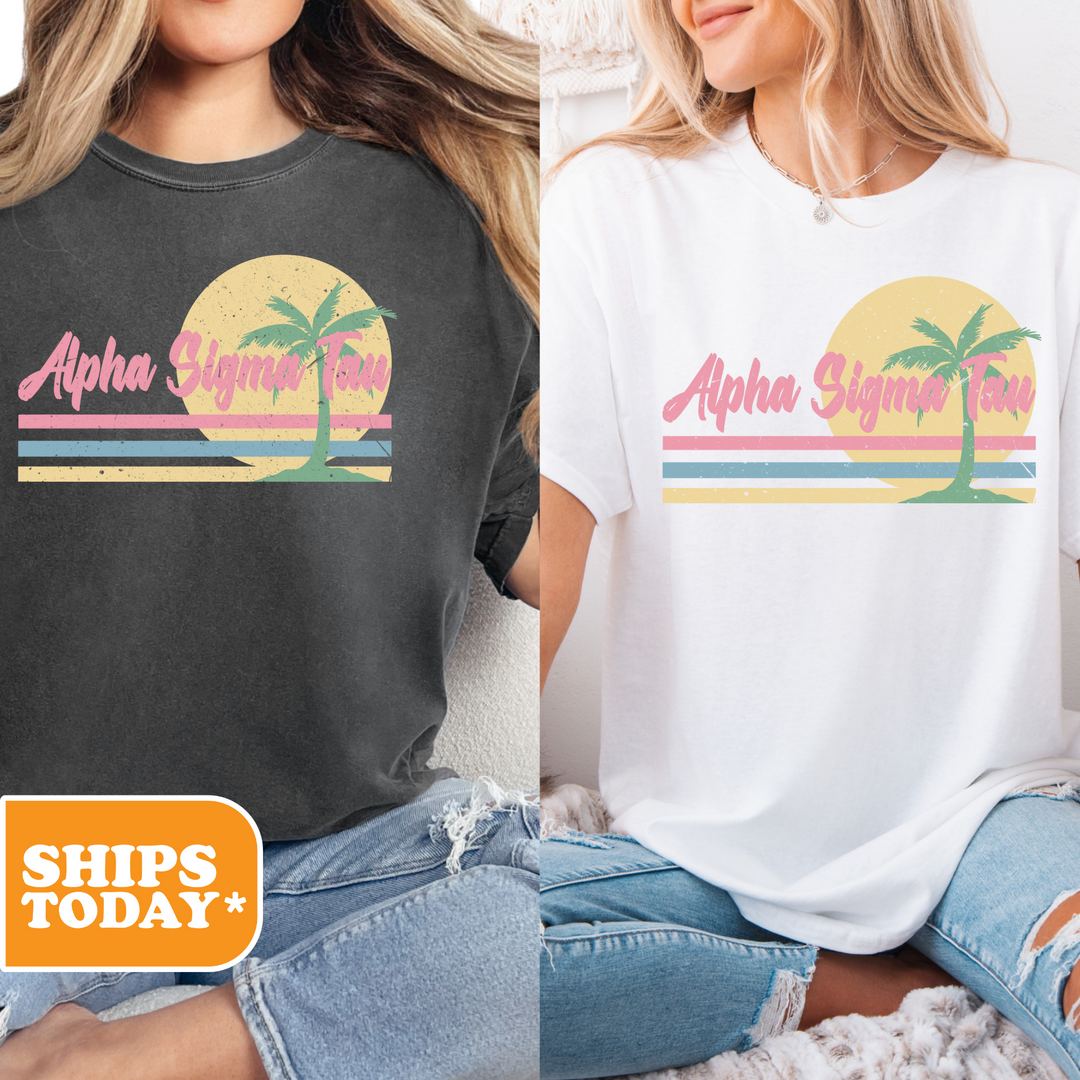 two women wearing t - shirts with palm trees on them