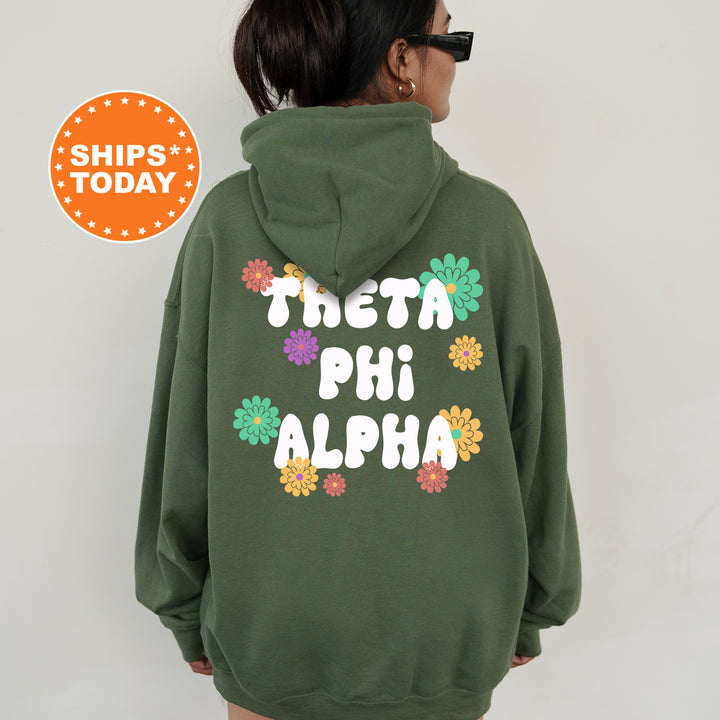 a woman wearing a green hoodie with the words, that's a phi