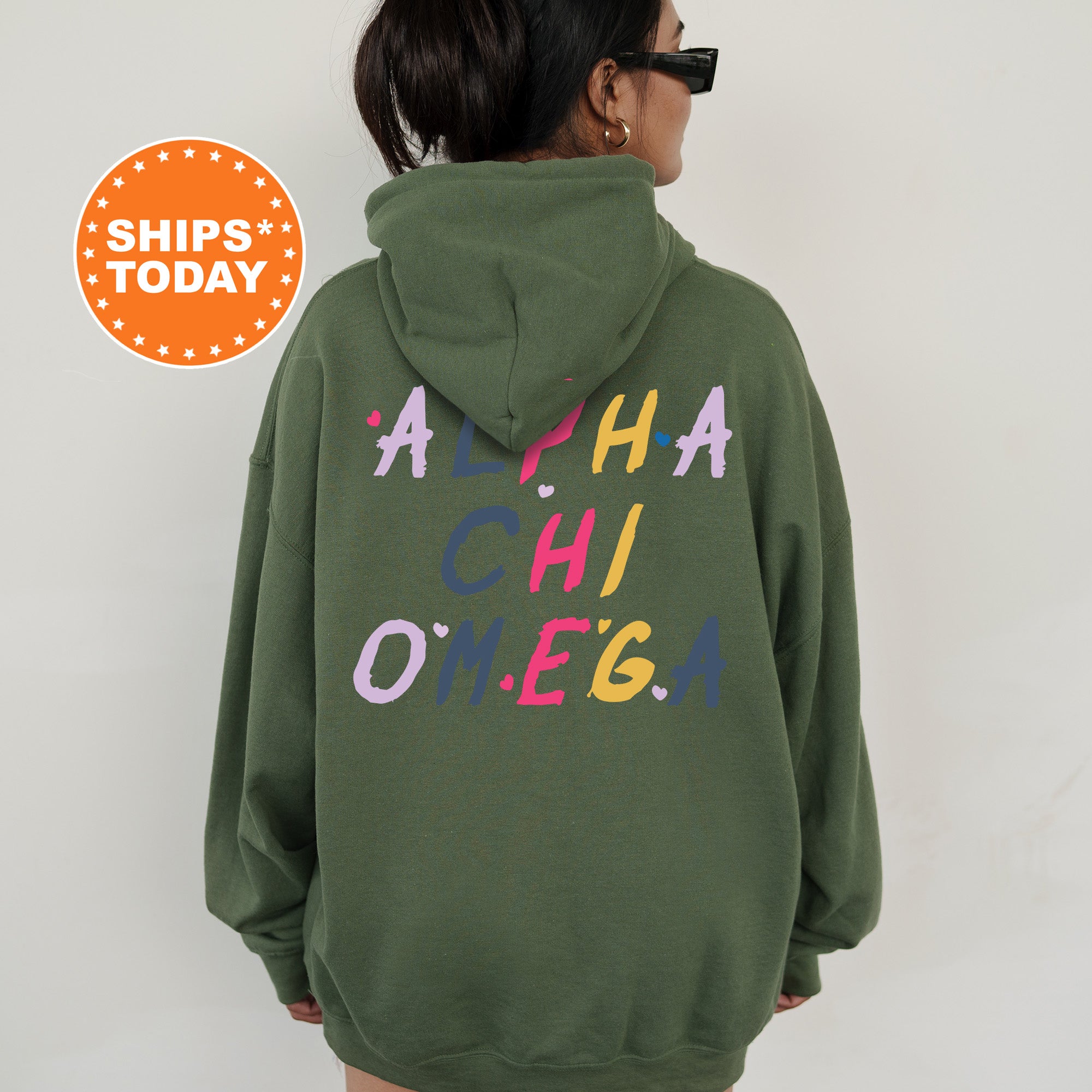 a woman wearing a green hoodie with the words ah ah ah oh ah oh