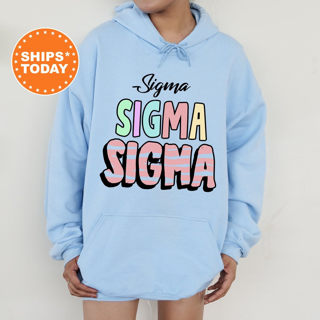 a person wearing a blue hoodie with the words stigma stigma on it