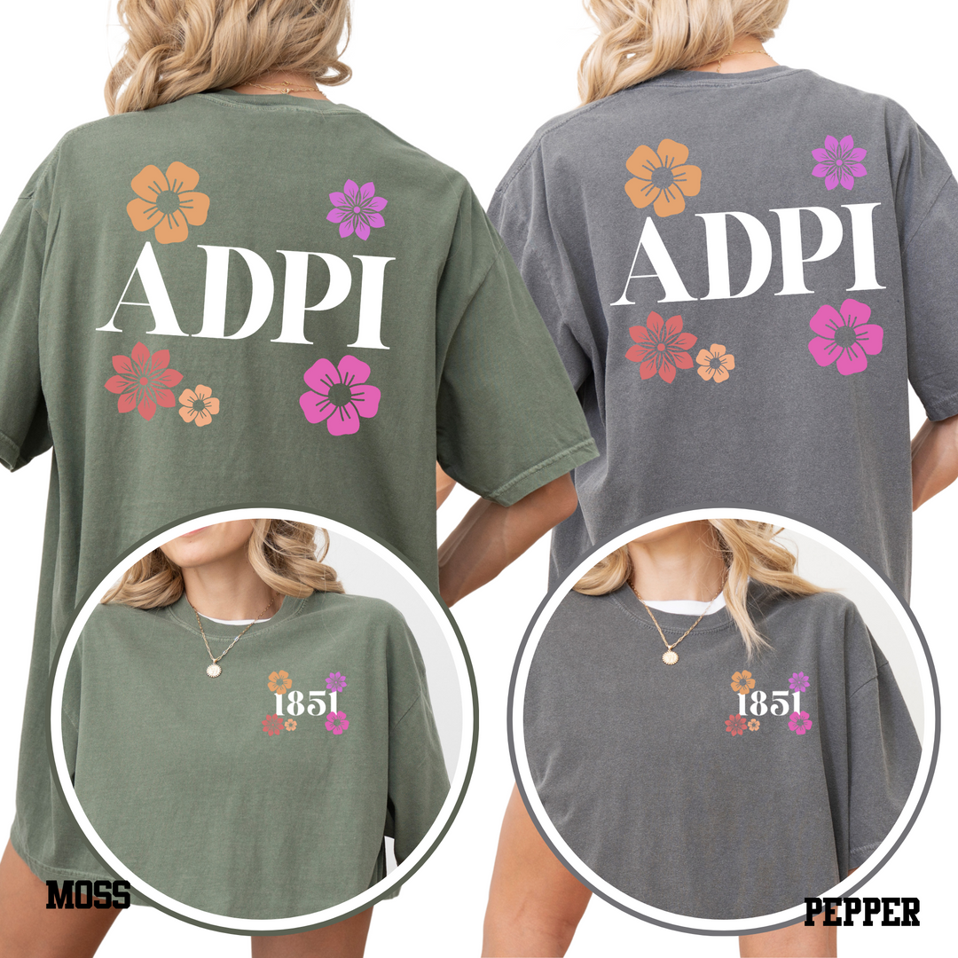 two women wearing t-shirts with the text "ADPI" printed on them.