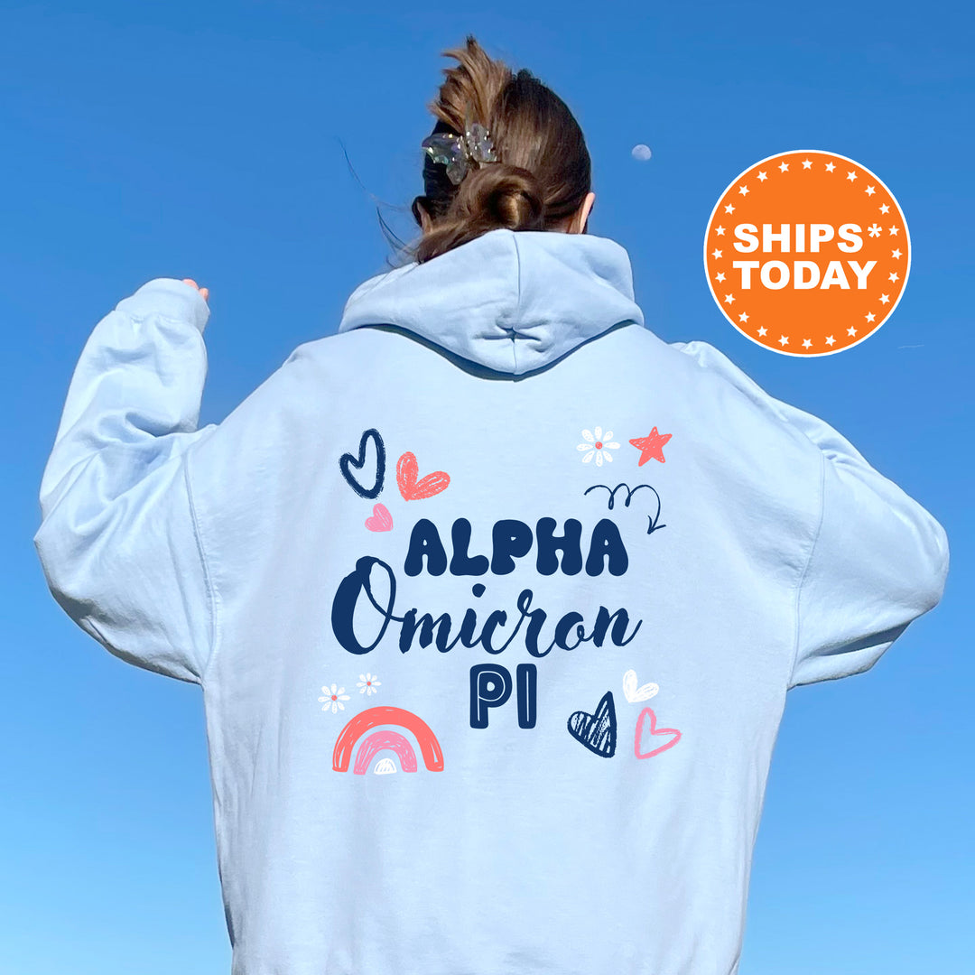 a woman wearing a white hoodie with the words aloh omicin pi