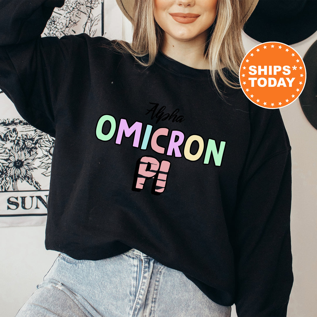 a woman wearing a black sweatshirt with the words omicron on it