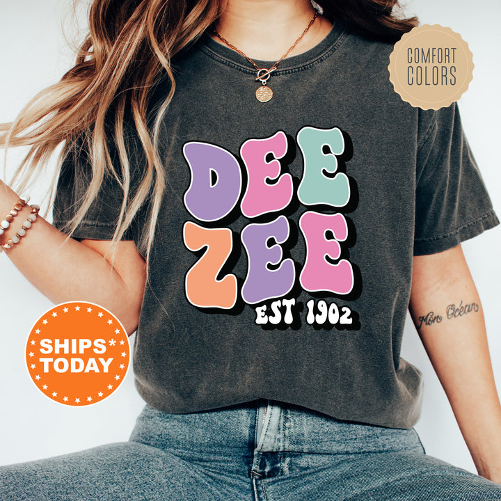 a woman wearing a t - shirt that says dee dee dee dee dee dee dee