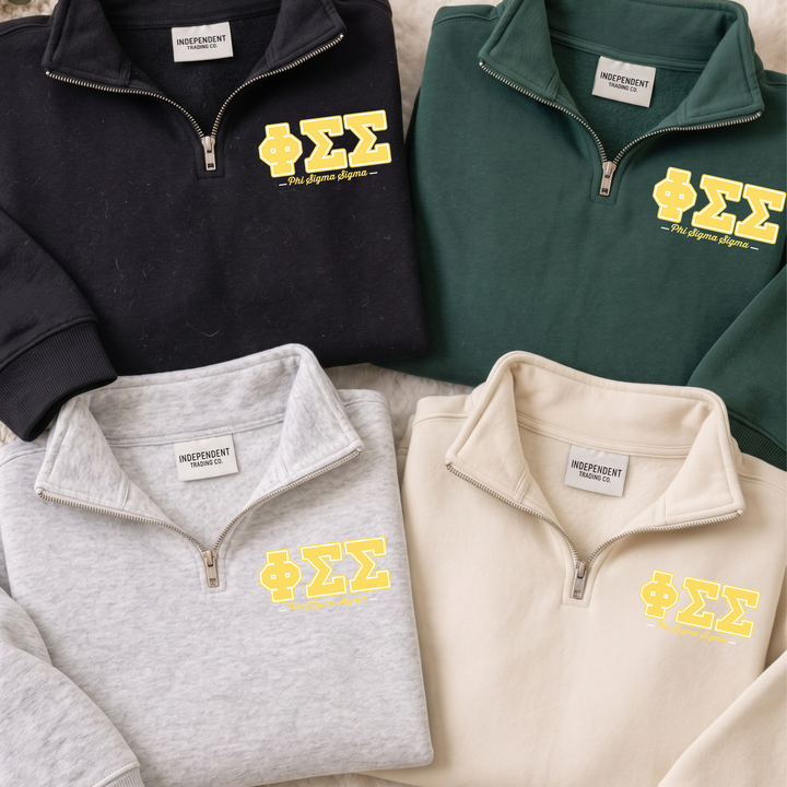 a collection of four zip-up sweatshirts, each with a different color and design, arranged side by side.