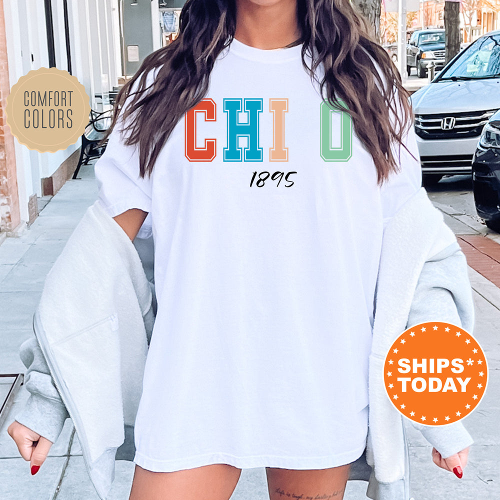a woman wearing a white shirt with the word chio on it
