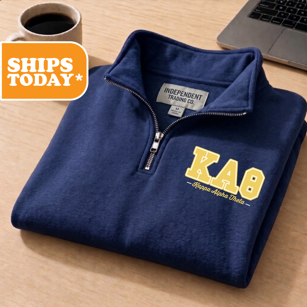 a blue shirt with a yellow ka8 logo on it