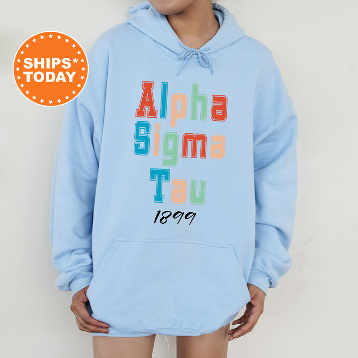 a person wearing a blue hoodie with the words aloha stigma tou