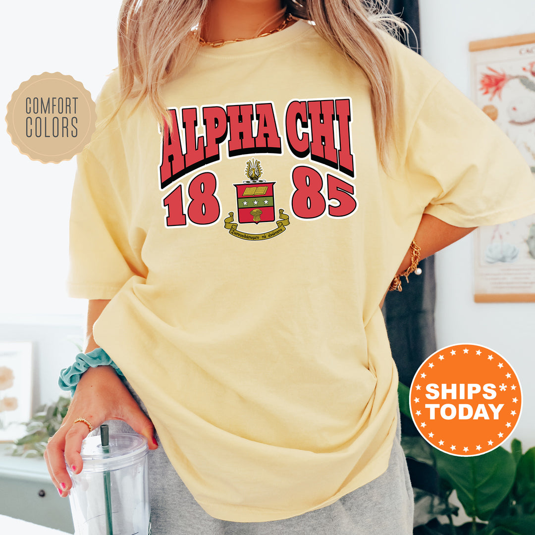 a woman in a yellow shirt holding a blender