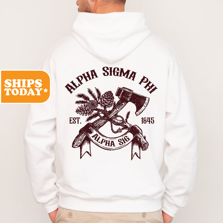a man wearing a white hoodie with an image of a hammer and a pine