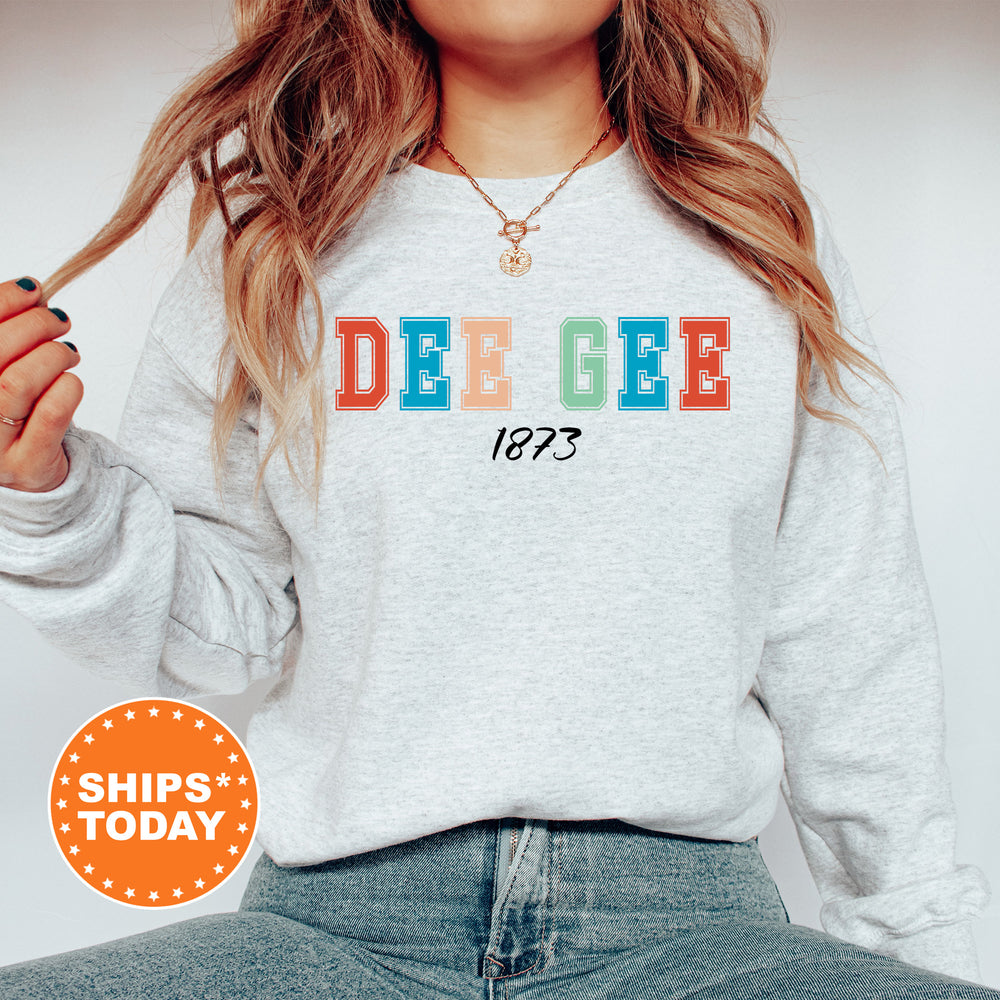 a woman wearing a sweatshirt with the word deucee printed on it