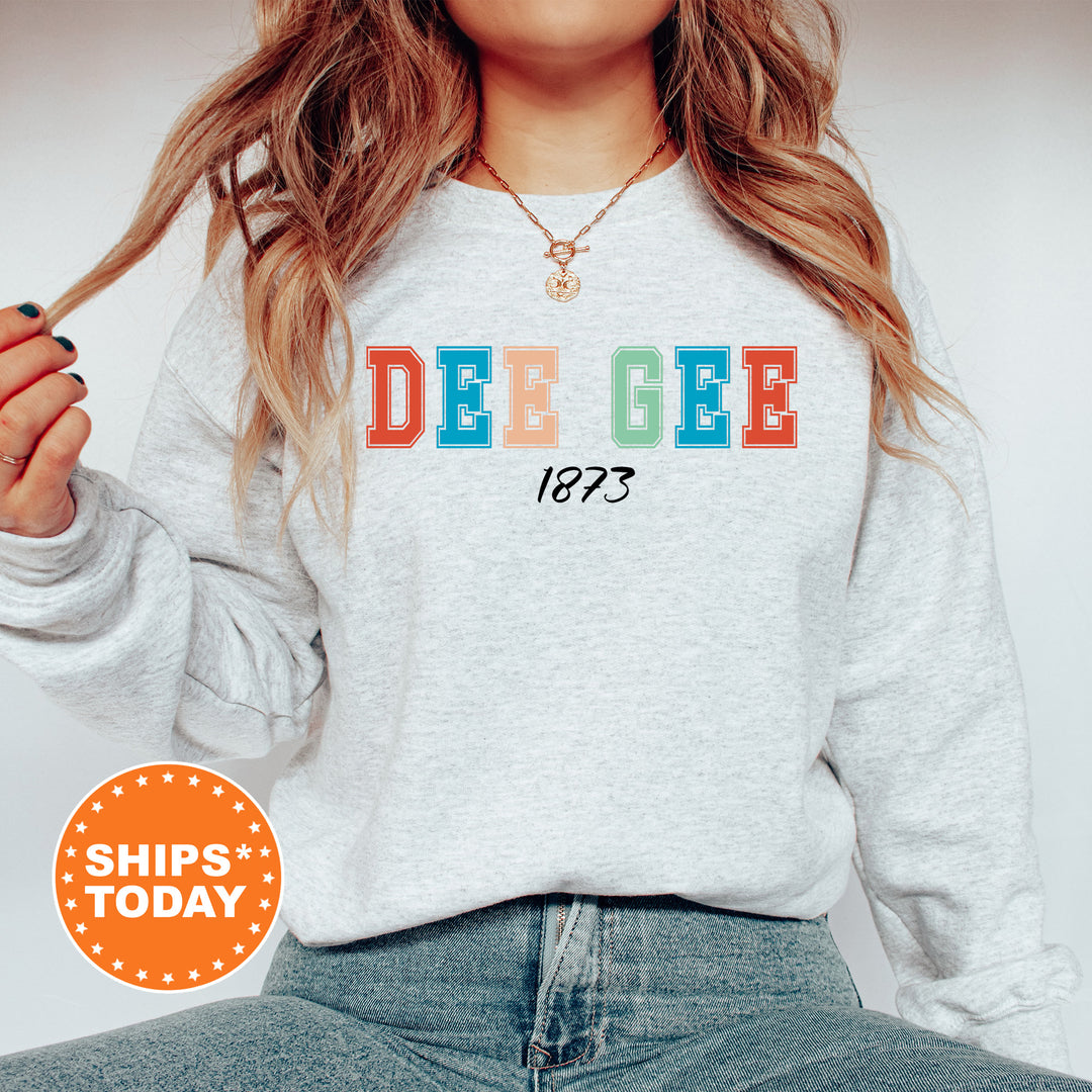 a woman wearing a sweatshirt with the word deucee printed on it