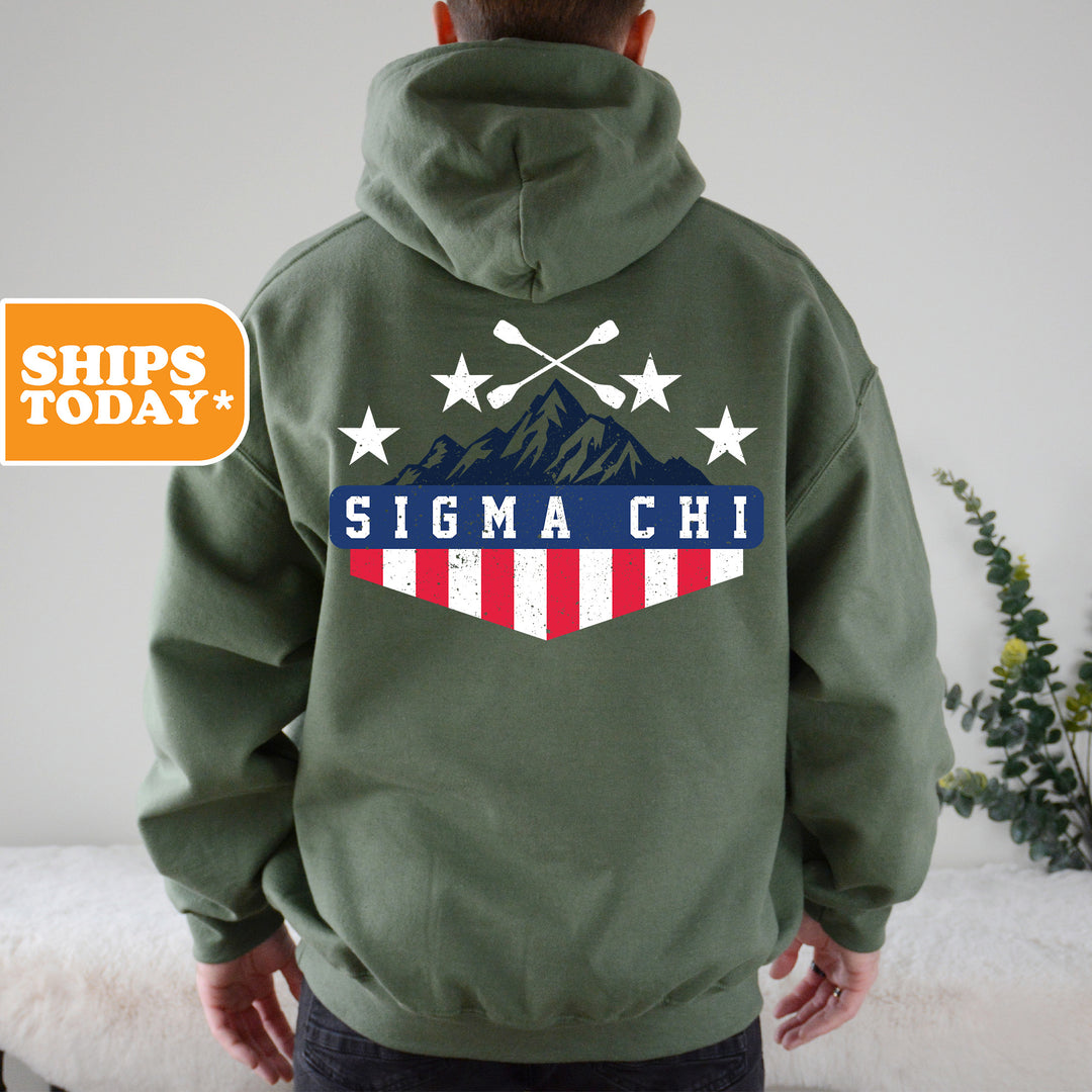 a man wearing a green hoodie with the slogan stigma chi on it