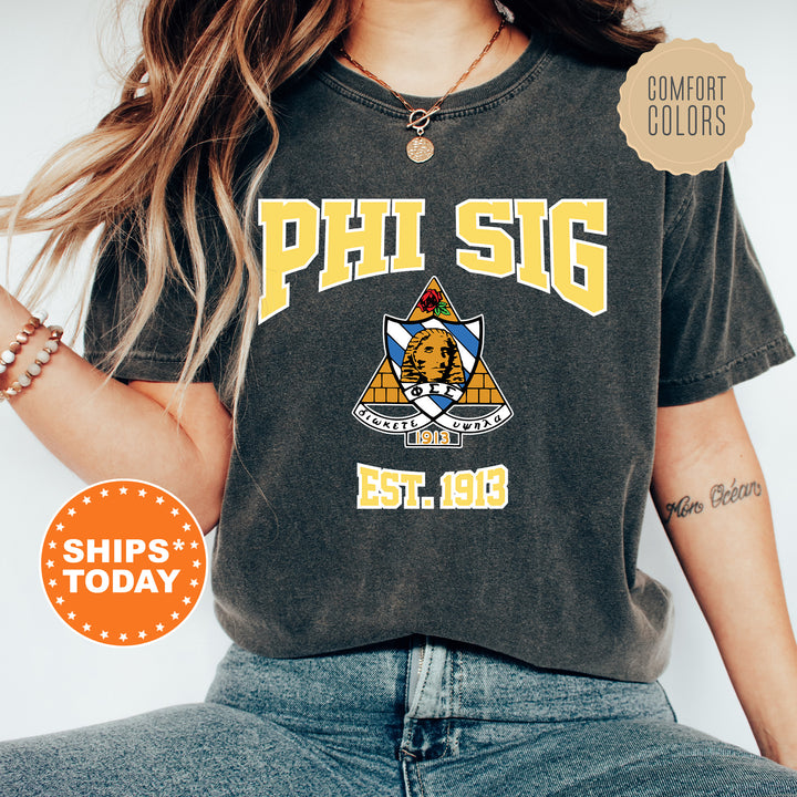 a woman wearing a phi sig tshirt