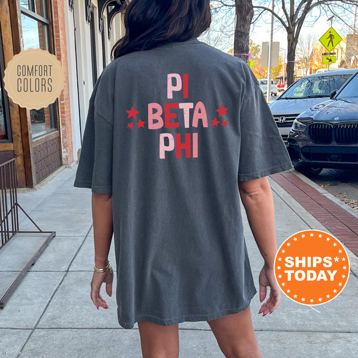 a woman walking down a sidewalk wearing a t - shirt