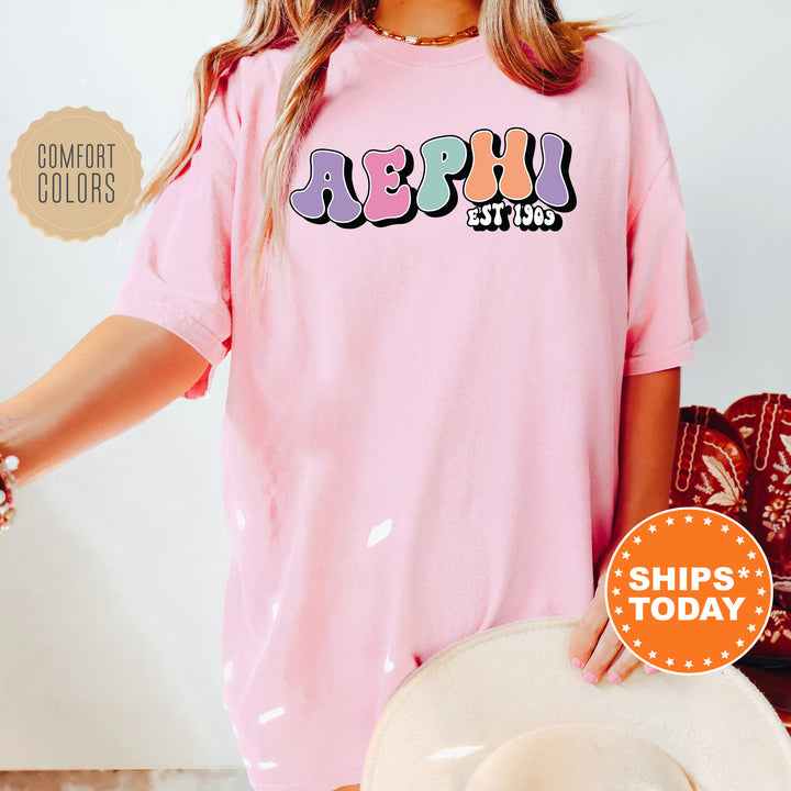 a woman wearing a pink shirt and hat