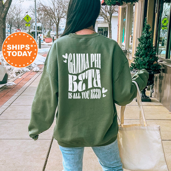 a woman walking down a sidewalk carrying a bag