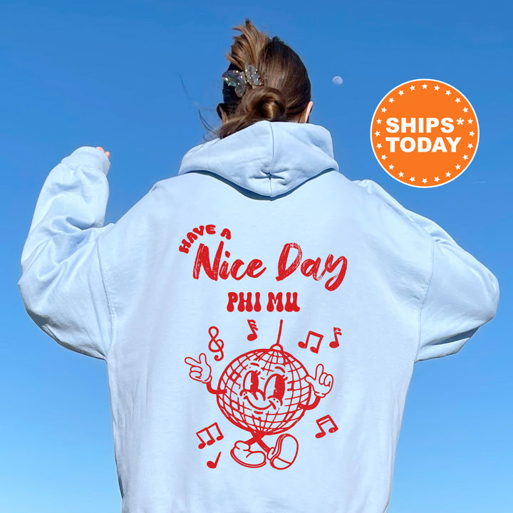 a woman wearing a white hoodie with the words nice day phil mail on it