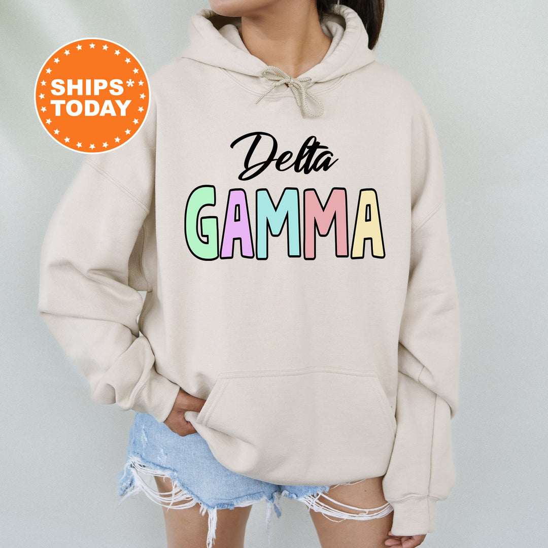 a woman wearing a sweatshirt that says delta garma