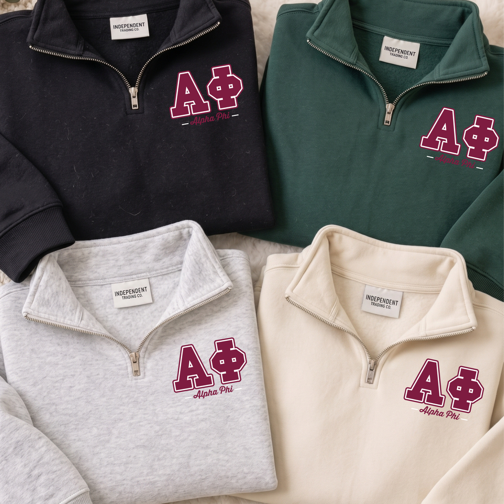 a group of polo shirts sitting on top of a bed
