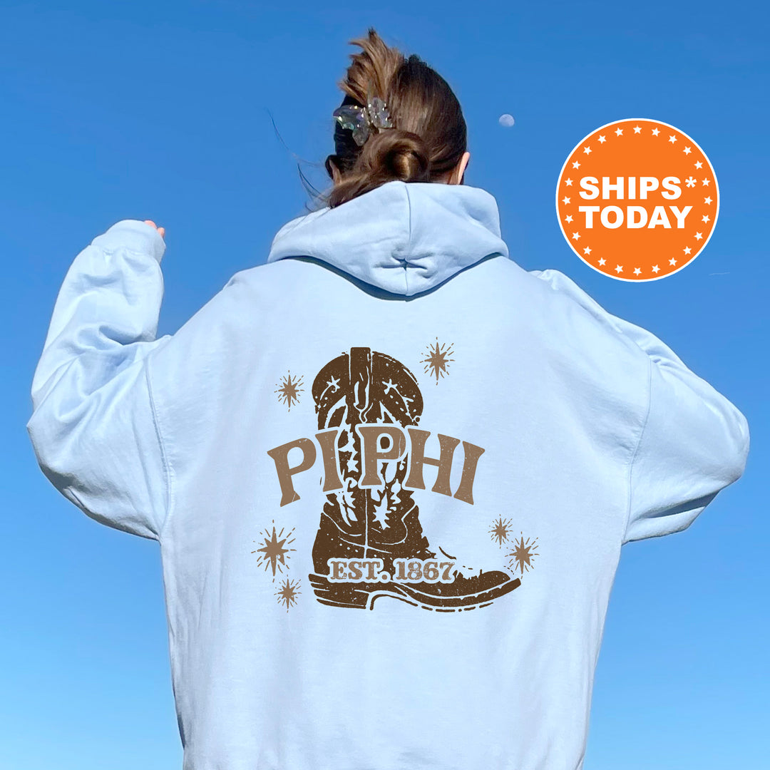 a woman wearing a white hoodie with the words pephi on it