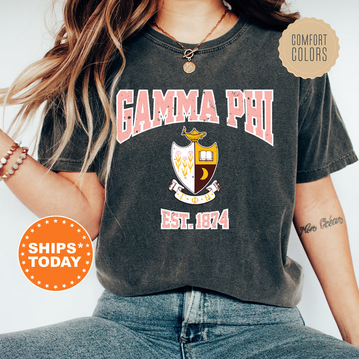 a woman wearing a shirt that says gama phi