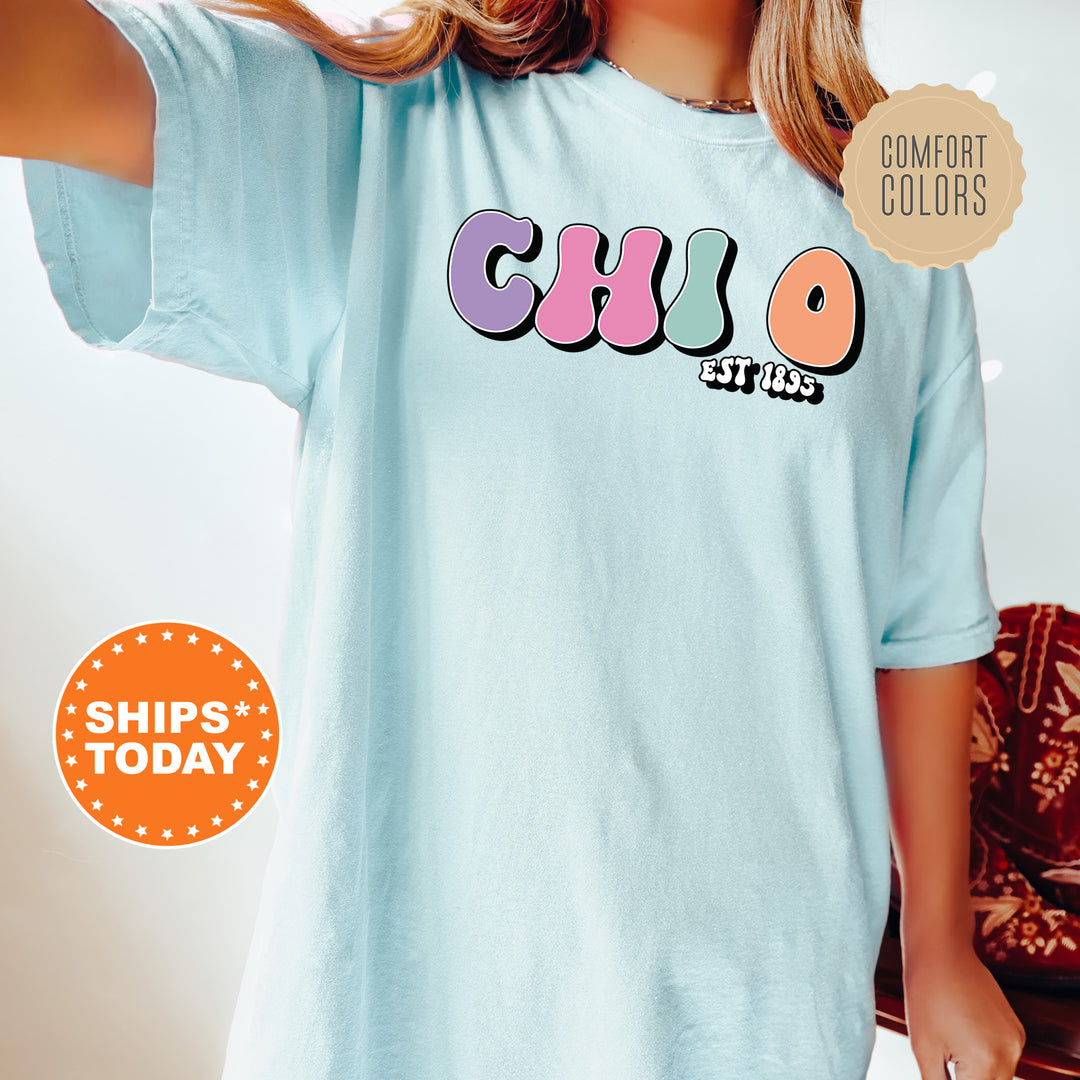 a woman wearing a blue shirt with the word club on it