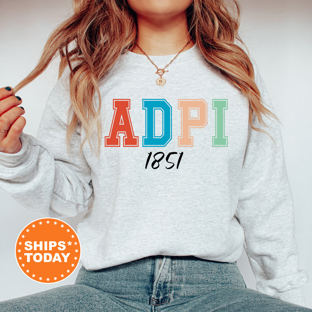 a woman wearing a sweatshirt with the words adpi printed on it