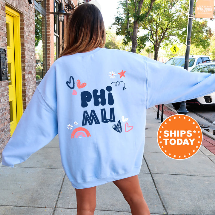 a woman walking down a sidewalk wearing a blue sweatshirt