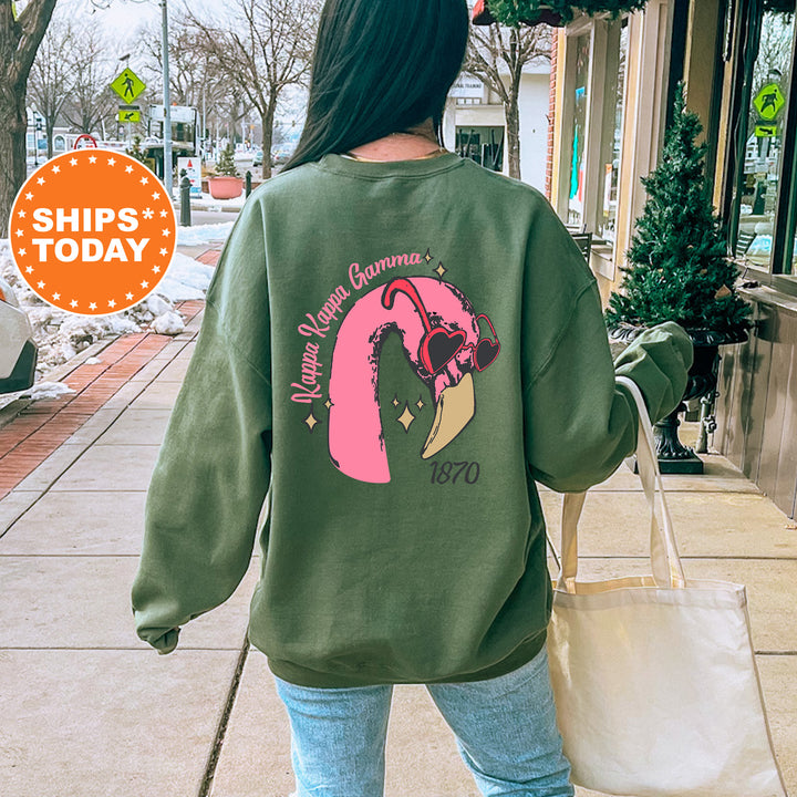 a woman walking down a sidewalk carrying a shopping bag