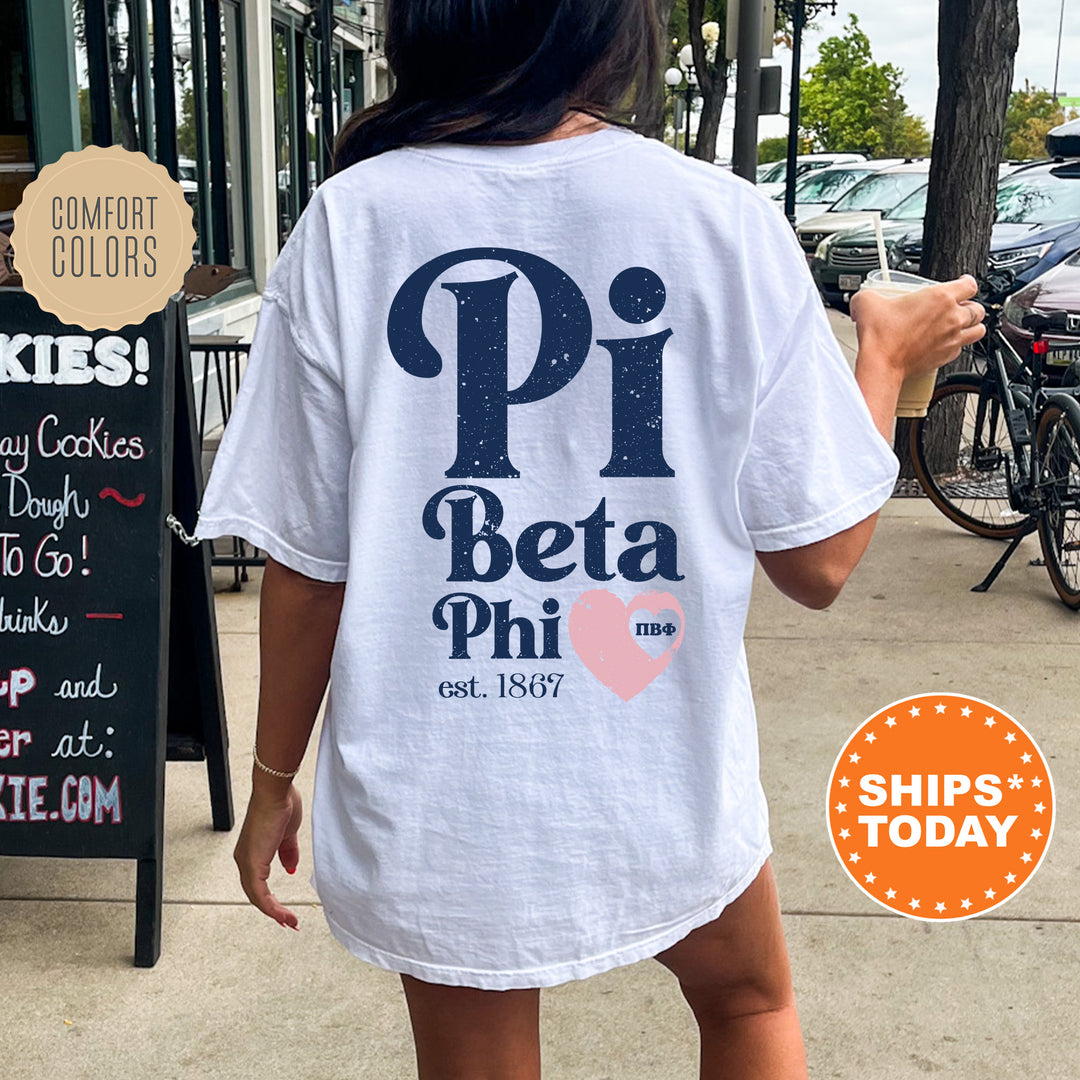 a woman walking down a sidewalk while wearing a pi shirt