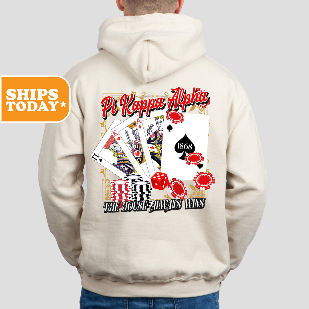 a man wearing a white hoodie with a back print of playing cards