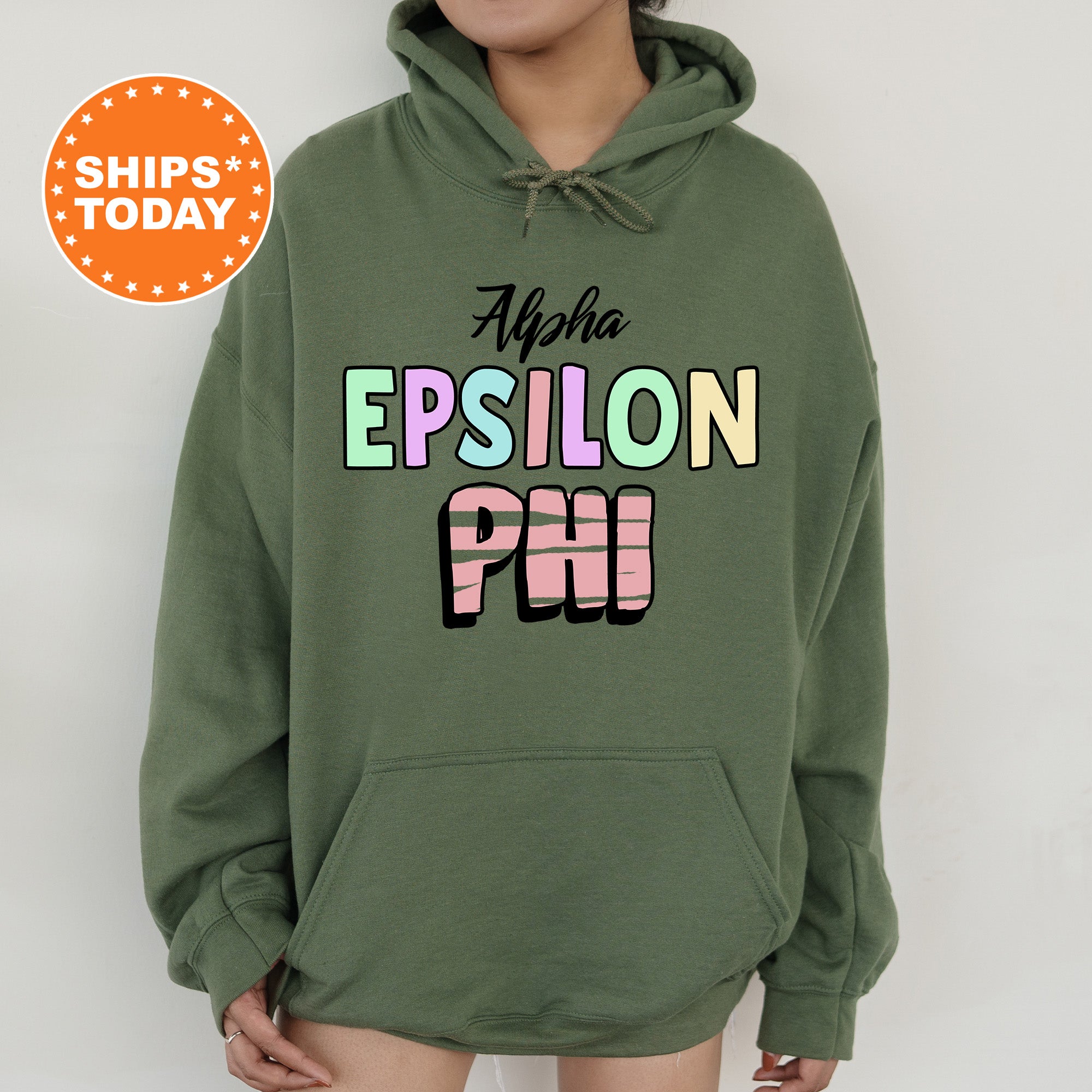 a person wearing a green hoodie with the words epiloon phi on it